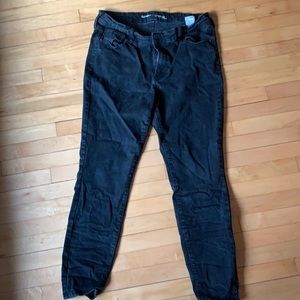 Black mid-rise skinny jeans